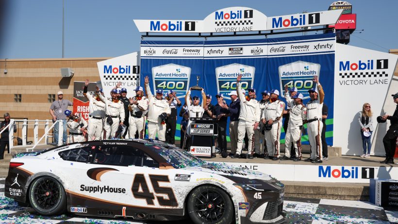 Tyler Reddick in Victory Lane at Kansas Motor Speedway (2026).