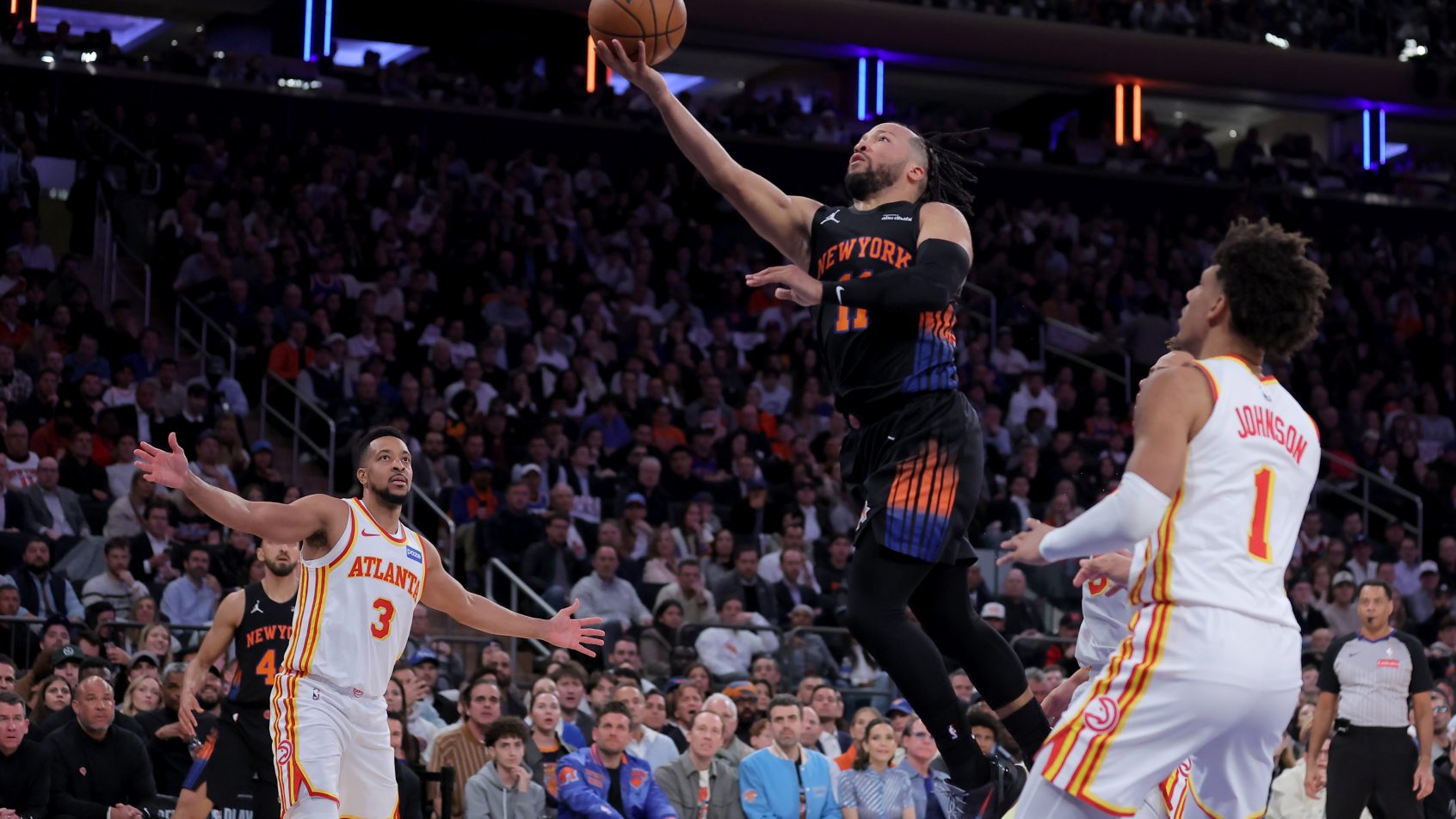 Jalen Brunson soars in for a lay up versus the Hawks.
