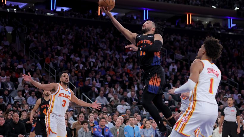 Jalen Brunson soars in for a lay up versus the Hawks.