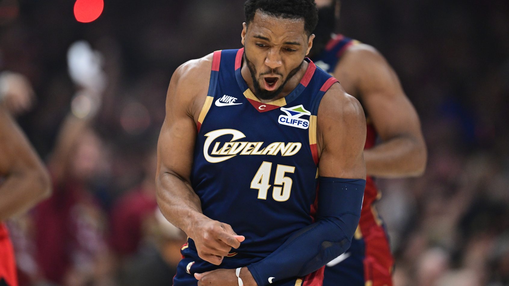 Donovan Mitchell celebrates after making a 3-pointer versus the Raptors.