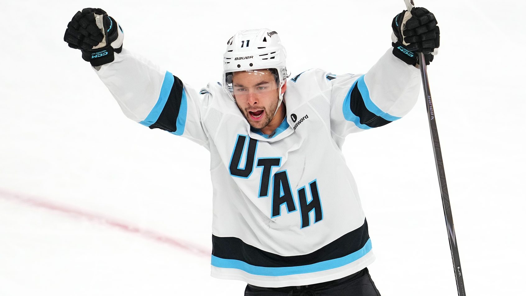 Dylan Guenther celebration