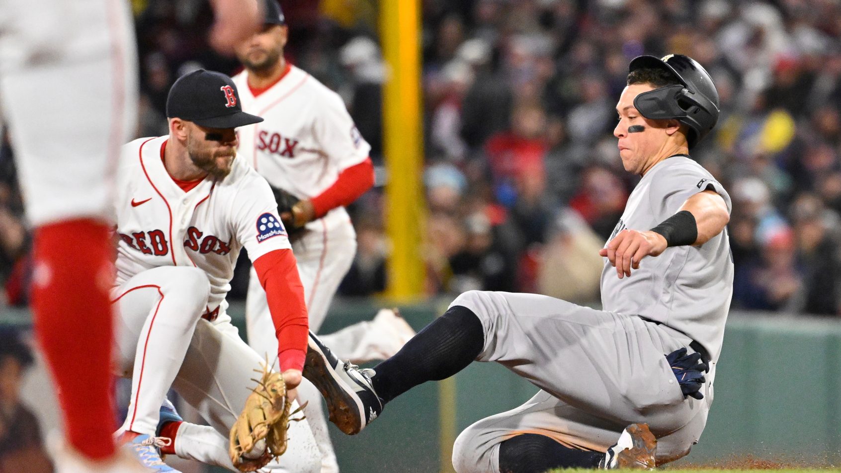 Aaron Judge tries to steal a base against the Red Sox