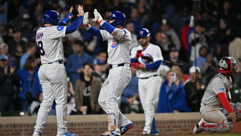 Seiya Suzuki celebrates with Ian Happ