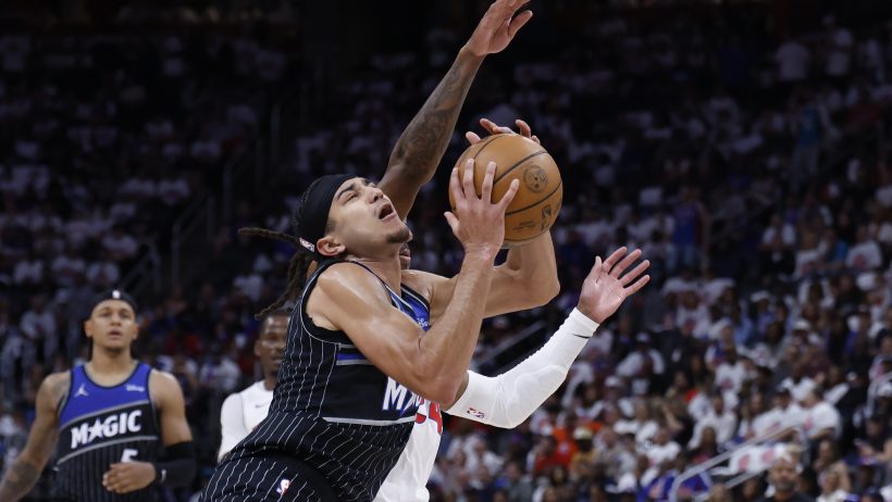 Paolo Banchero is fouled going to the basket against the Pistons.