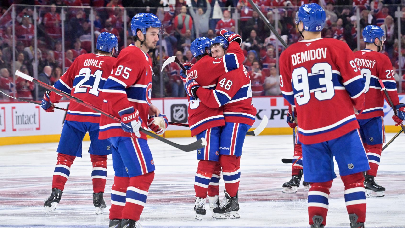 The Habs celebrate Lane Hutson's OT winner in Game 3 versus the Lightning.