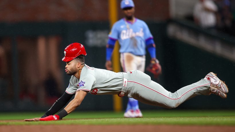 Philadelphia Phillies center fielder Justin Crawford slides into second base