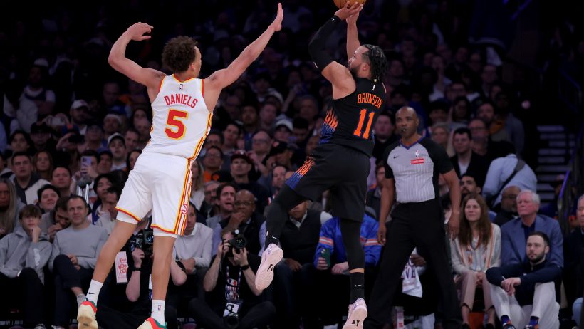 Jalen Brunson soars for a jump shot against the Hawks.