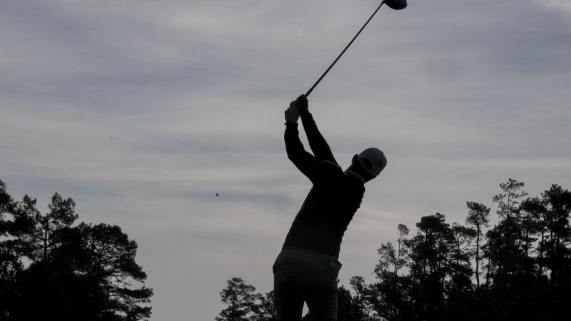 BetMGM vs. theScore Bet, who has the best Masters props? Silhouette of golfer.