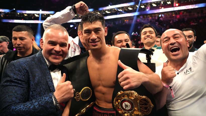 May 7, 2022; Las Vegas, Nevada, USA; Dimitry Bivol (black trunks) celebrates with his team after defeating Canelo Alvarez (not pictured) during their light heavyweight championship bout at T-Mobile Arena. Mandatory Credit: Joe Camporeale-Imagn Images