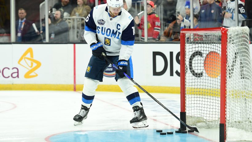 Alexander Barkov clears pucks out of the net