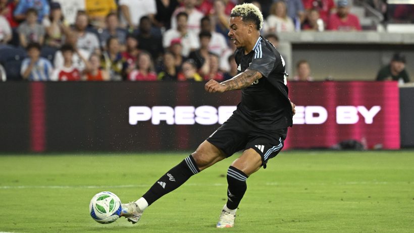 Morgan Rogers taking a shot for Aston Villa
