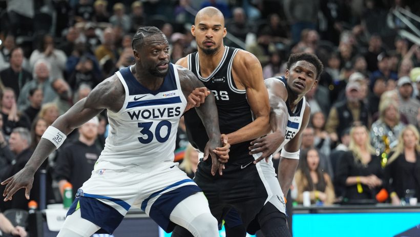 Minnesota Timberwolves forward Julius Randle battling with San Antonio Spurs forward Victor Wembanyama