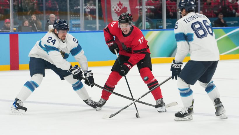 Macklin Celebrini makes a pass