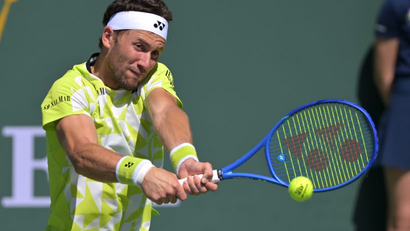 Casper Ruud hitting a backhand