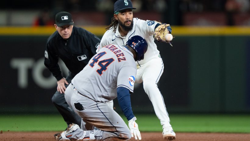 Yordan Alvarez slides in to avoid a tag