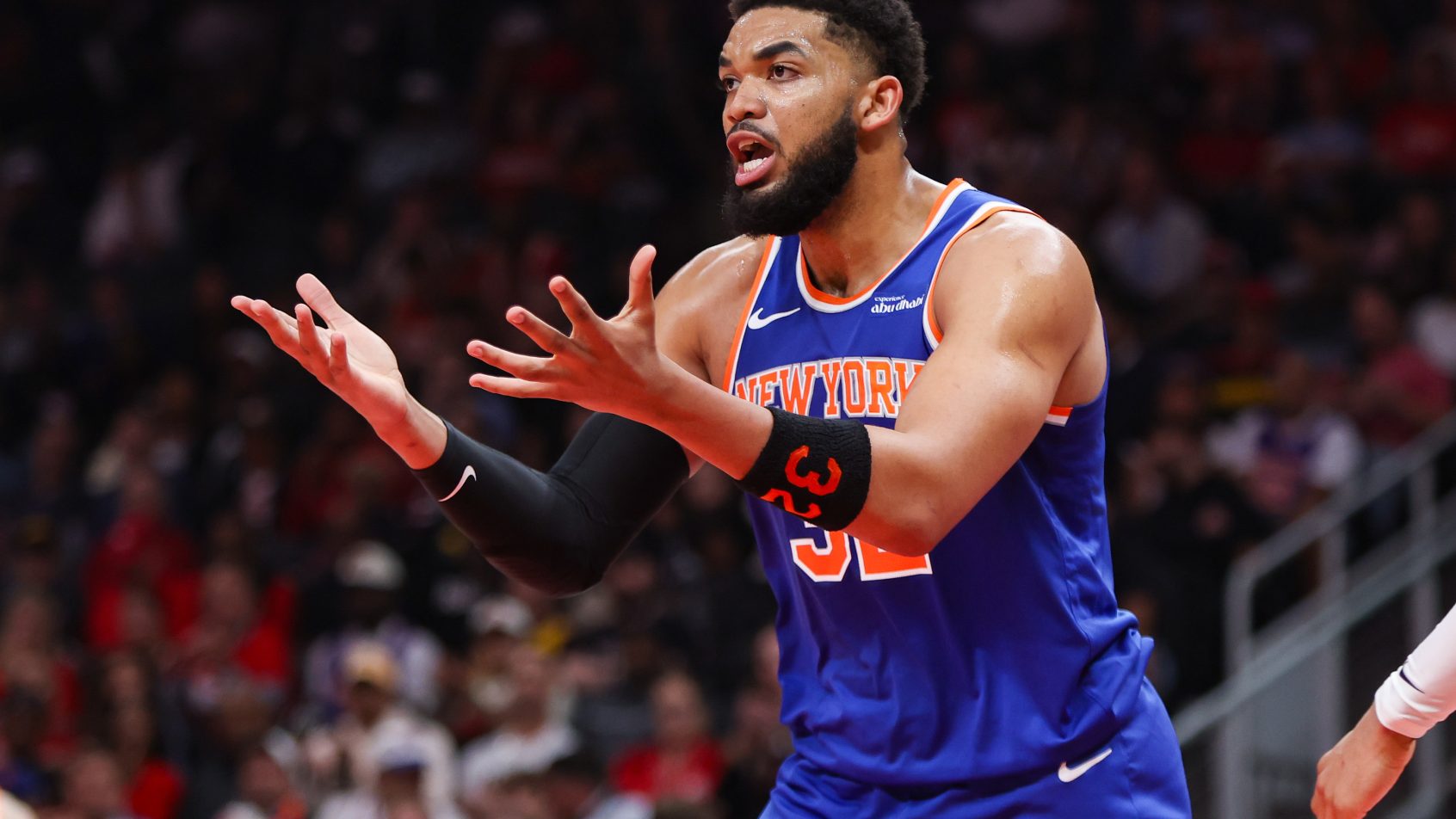 Karl Anthony Towns talking to ref
