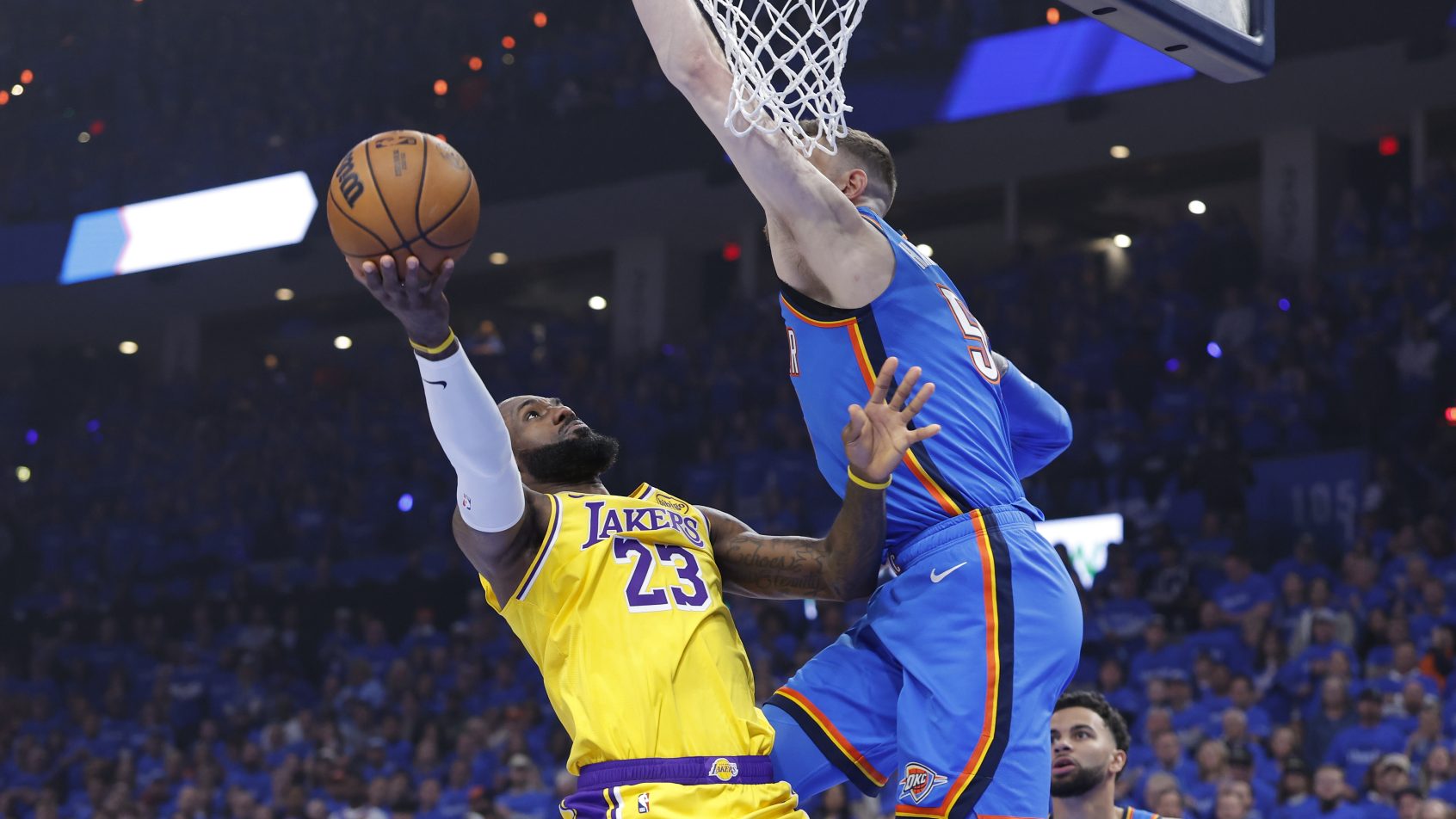 LeBron James drives to the Thunder hoop in Game 1 of the LA vs OKC playoff series.