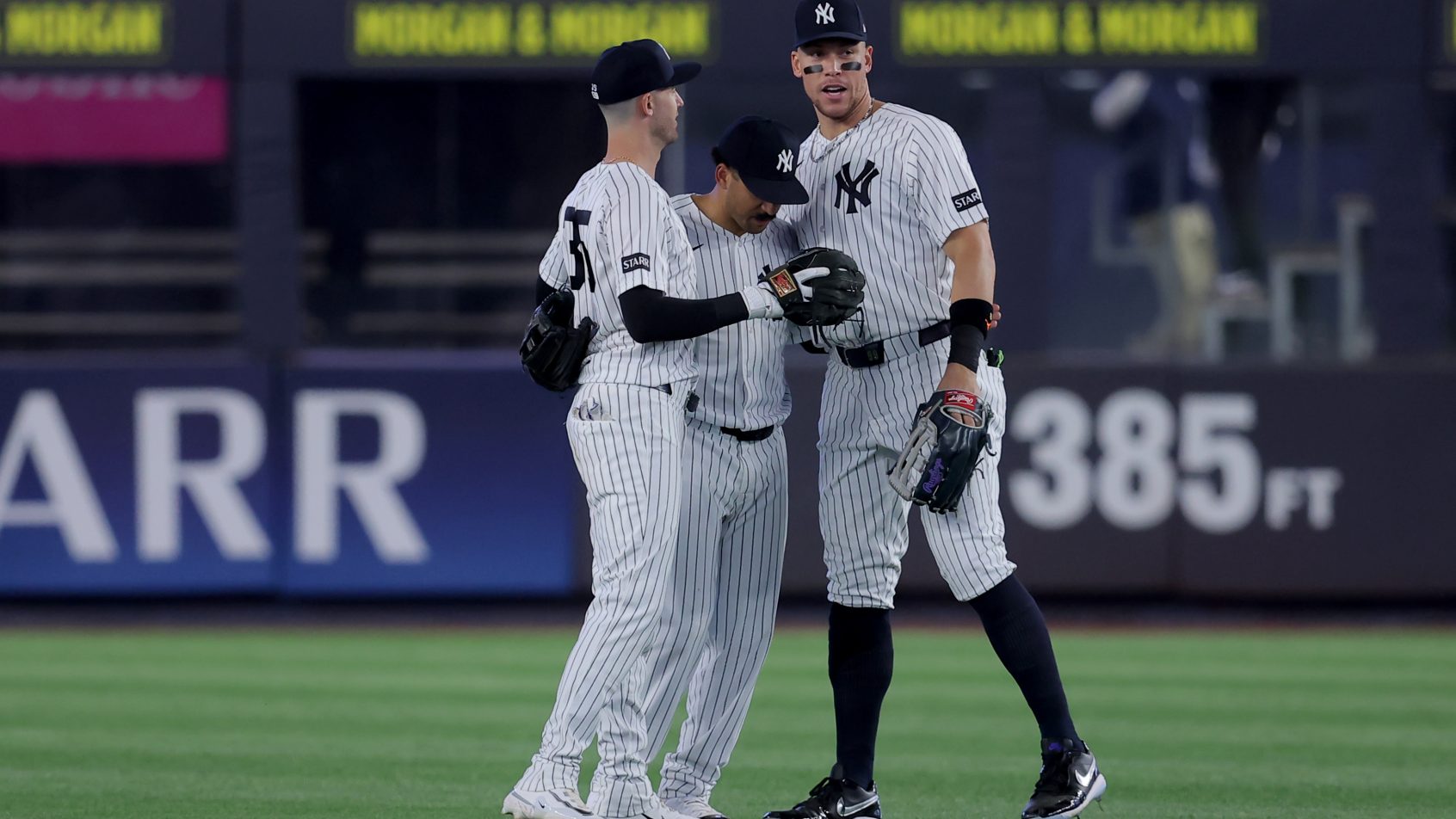 Aaron Judge celebrates with teammates