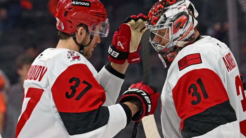 The Hurricanes celebrate their Game 3 win over the Flyers.