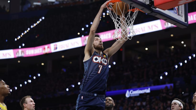 Chet Holmgren rises up for the dunk in a playoff game versus the Lakers.