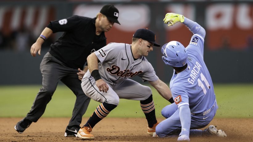 Detroit Tigers shortstop Kevin McGonigle tags out Kansas City Royals third baseman Maikel Garcia