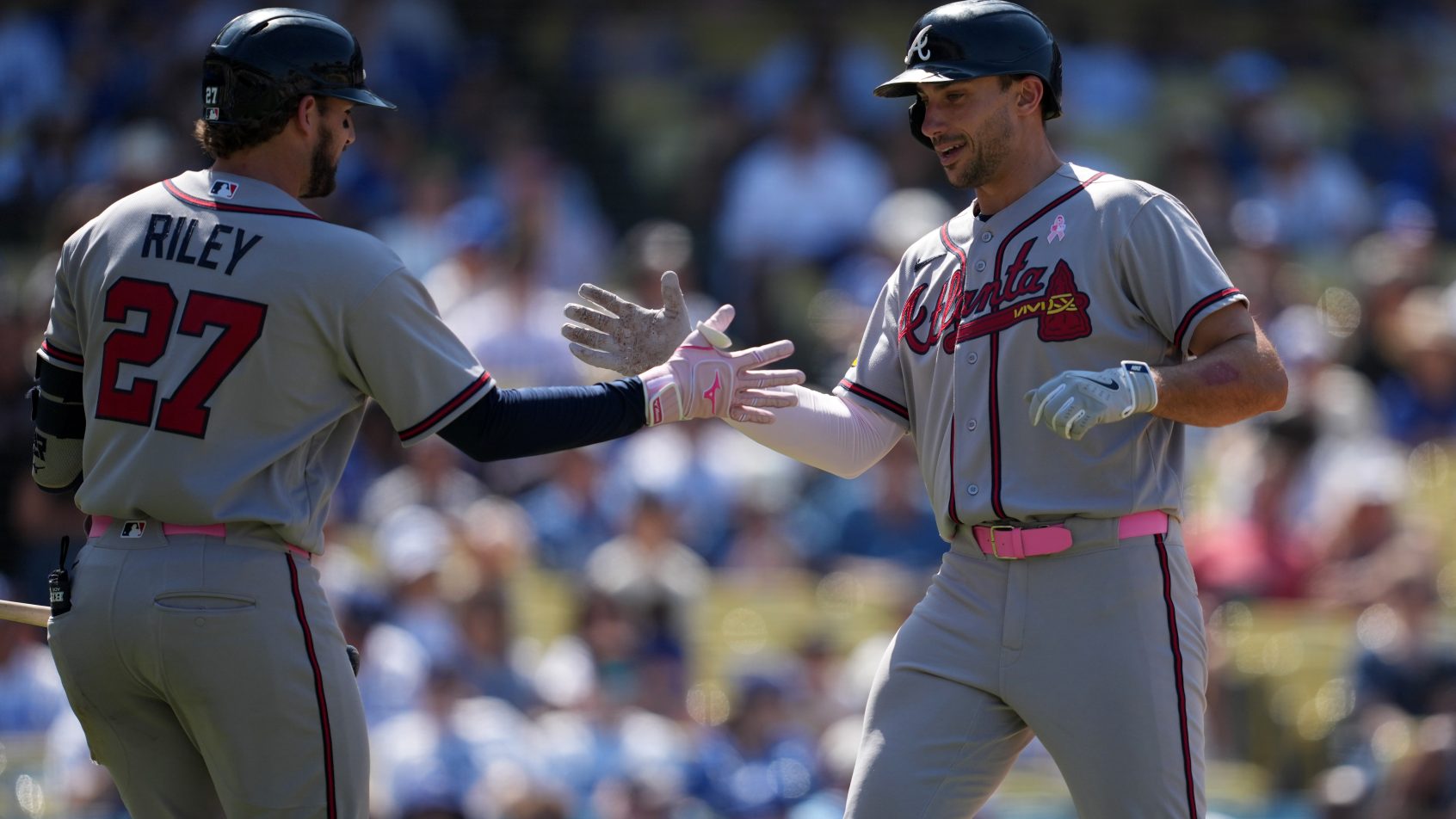 Matt Olson celebrates with Austin Riley