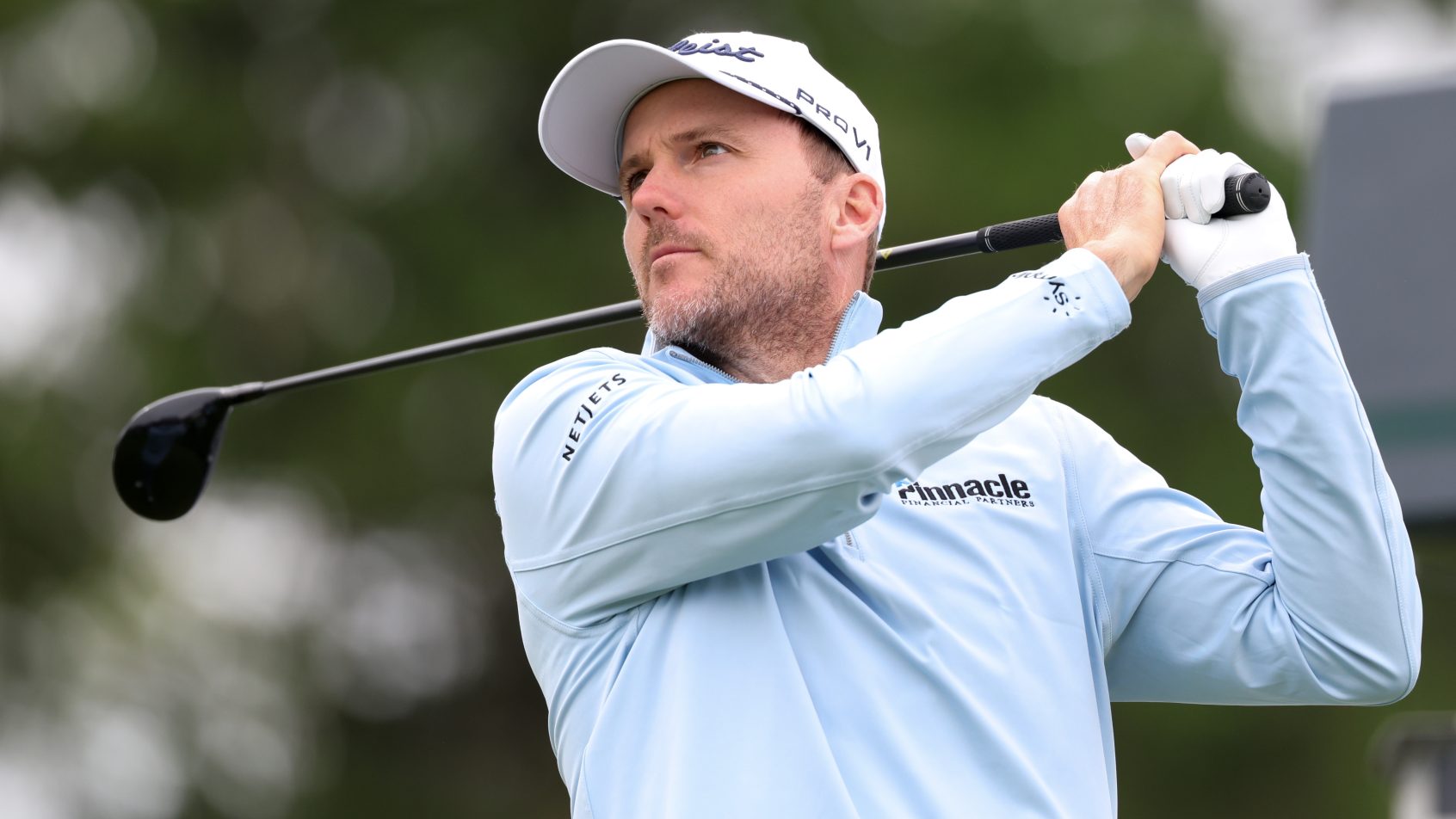 Russell Henley tees off at a practice round for the PGA Championship.