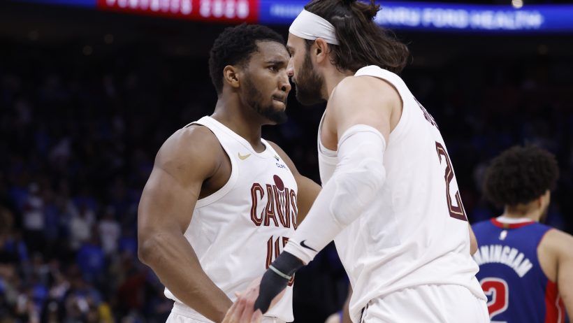 Donovan Mitchell celebrates with Max Strus during a Cavaliers playoff win.