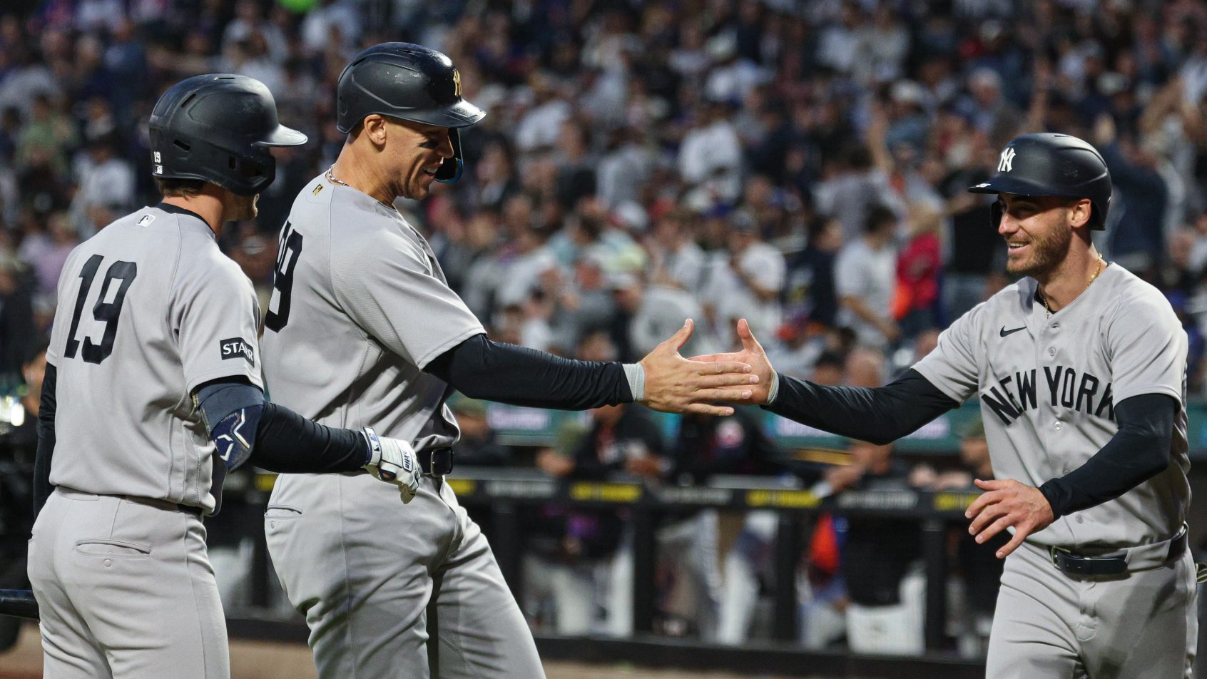 Cody Bellinger and right fielder Aaron Judge high-five