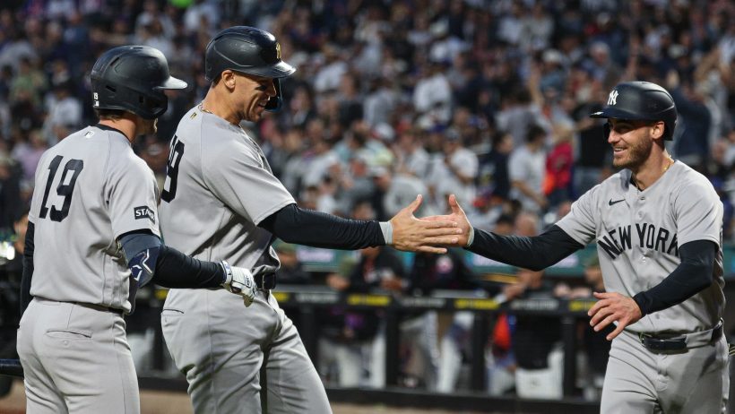 Cody Bellinger and right fielder Aaron Judge high-five
