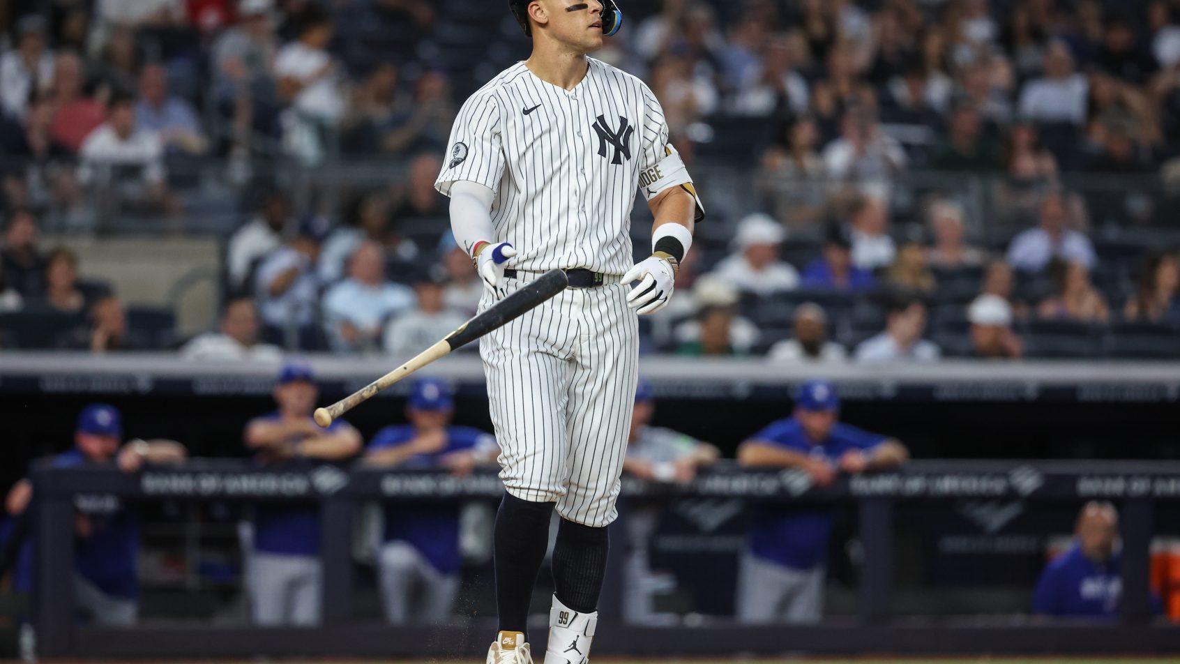 Aaron Judge flips his bat.