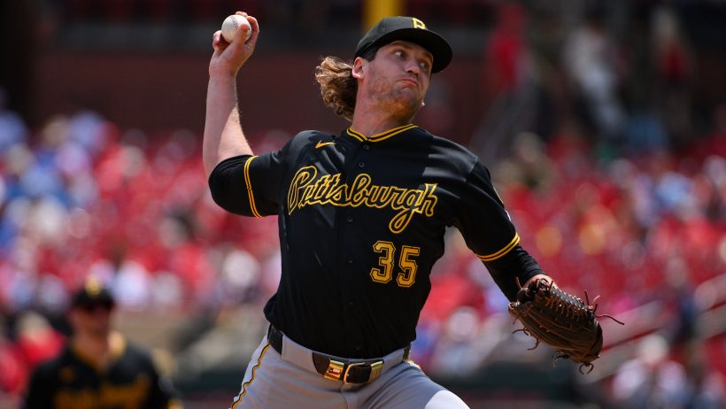 Braxton Ashcraft delivers a pitch to the rival Cardinals.