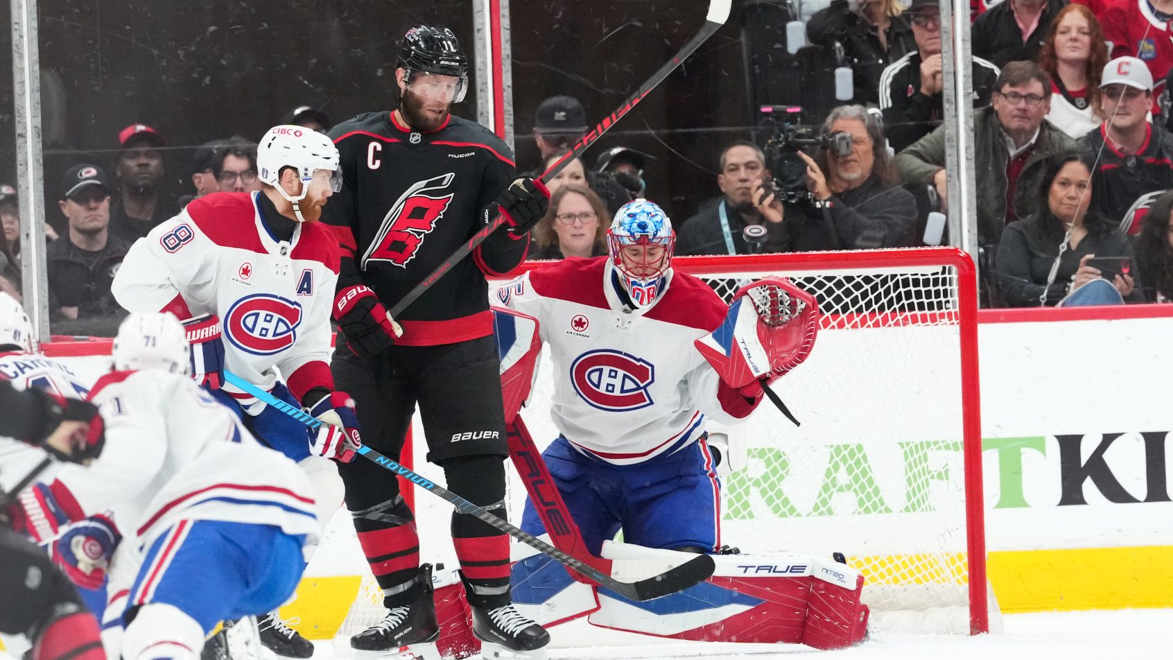 Jakub Dobes makes a save against the Hurricanes.
