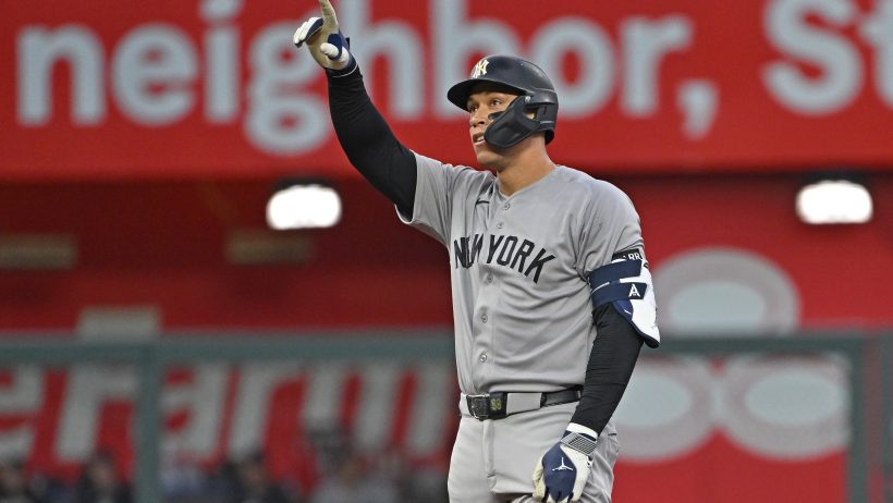 Aaron Judge signals to the dugout after a hit versus the Royals.