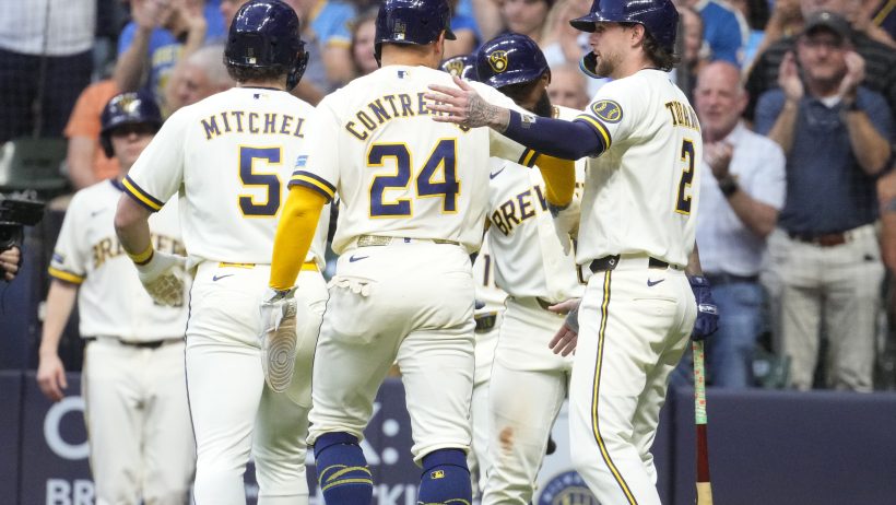 The Brewers celebrate a victory over the rival Cardinals.