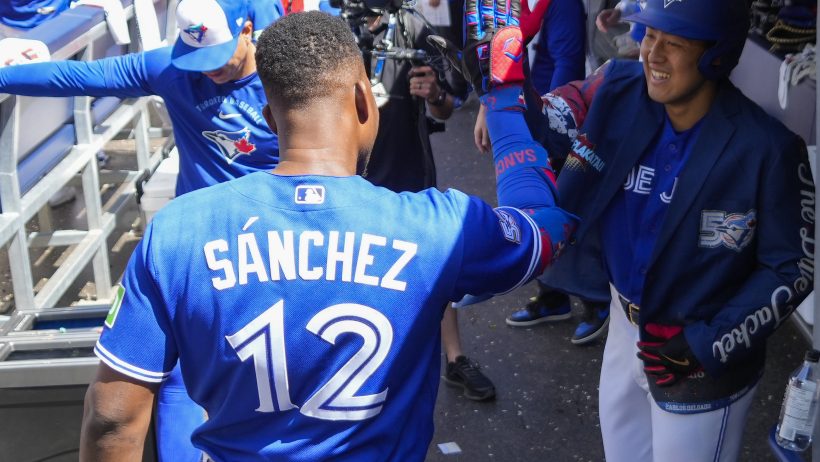 The Blue Jays dugout celebrates a run versus the Marlins.