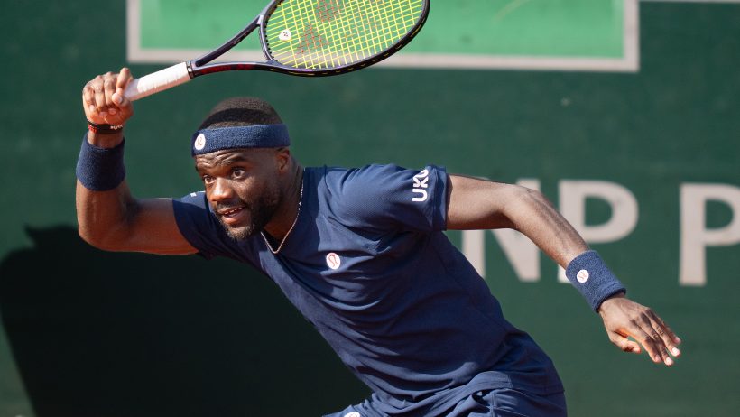 Frances Tiafoe hitting a forehand
