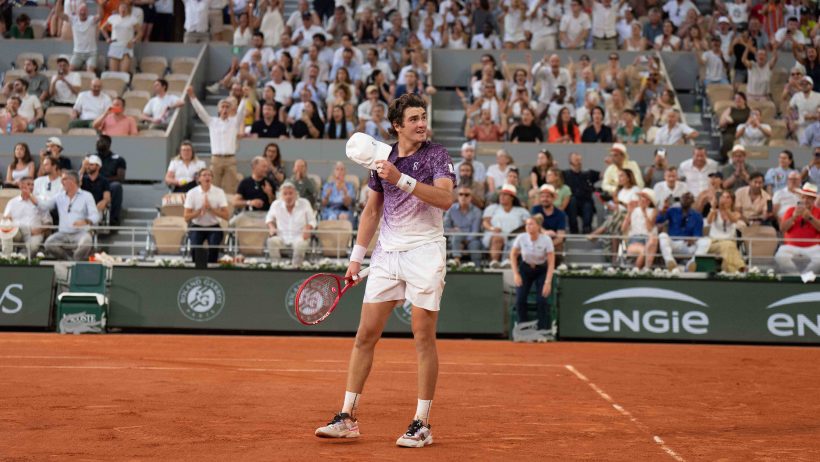 Joao Fonseca of Brazil celebrates winning his match against Novak Djokovic
