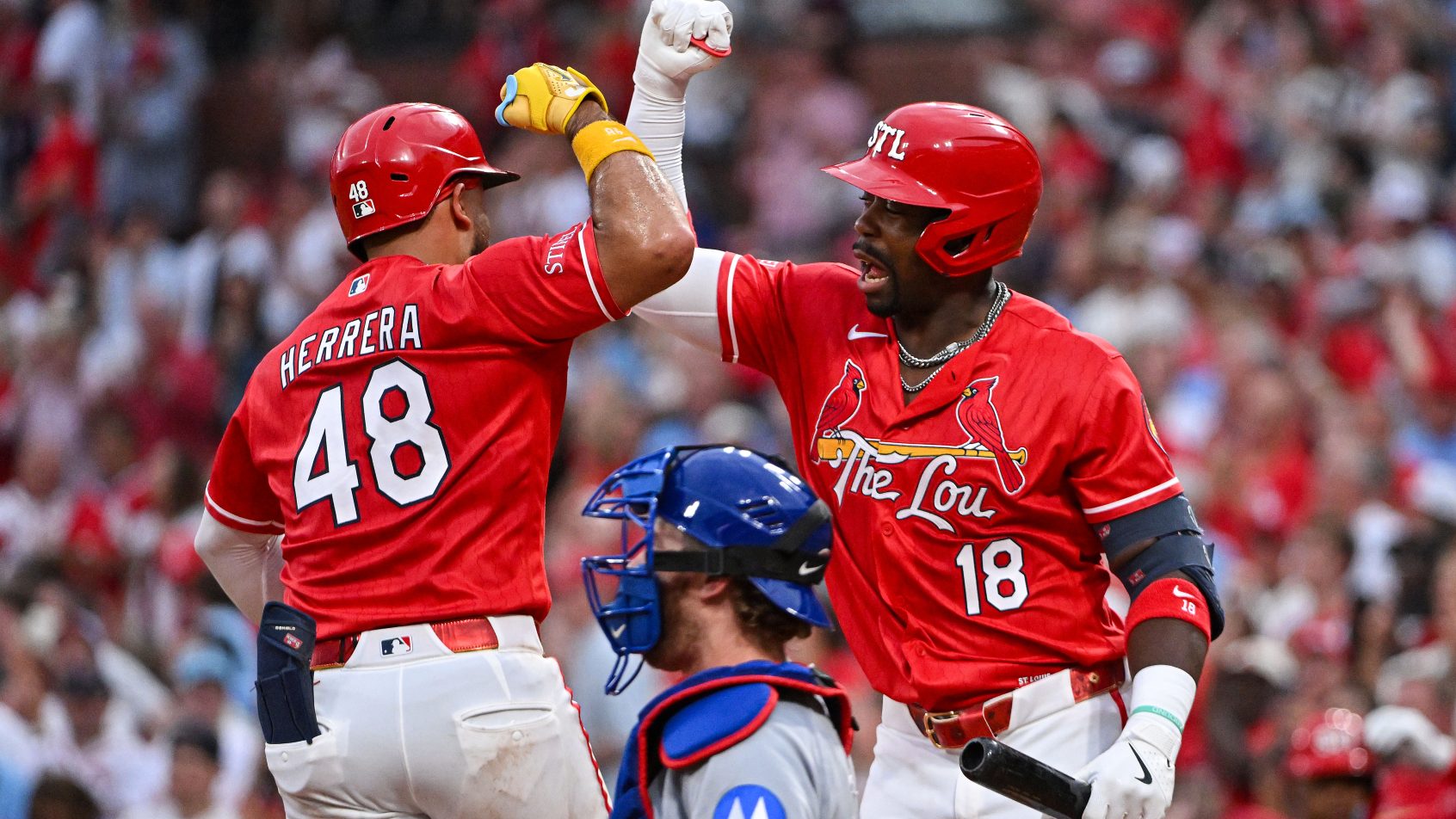 Jordan Walker celebrating with Ivan Herrera for the St. Louis Cardinals