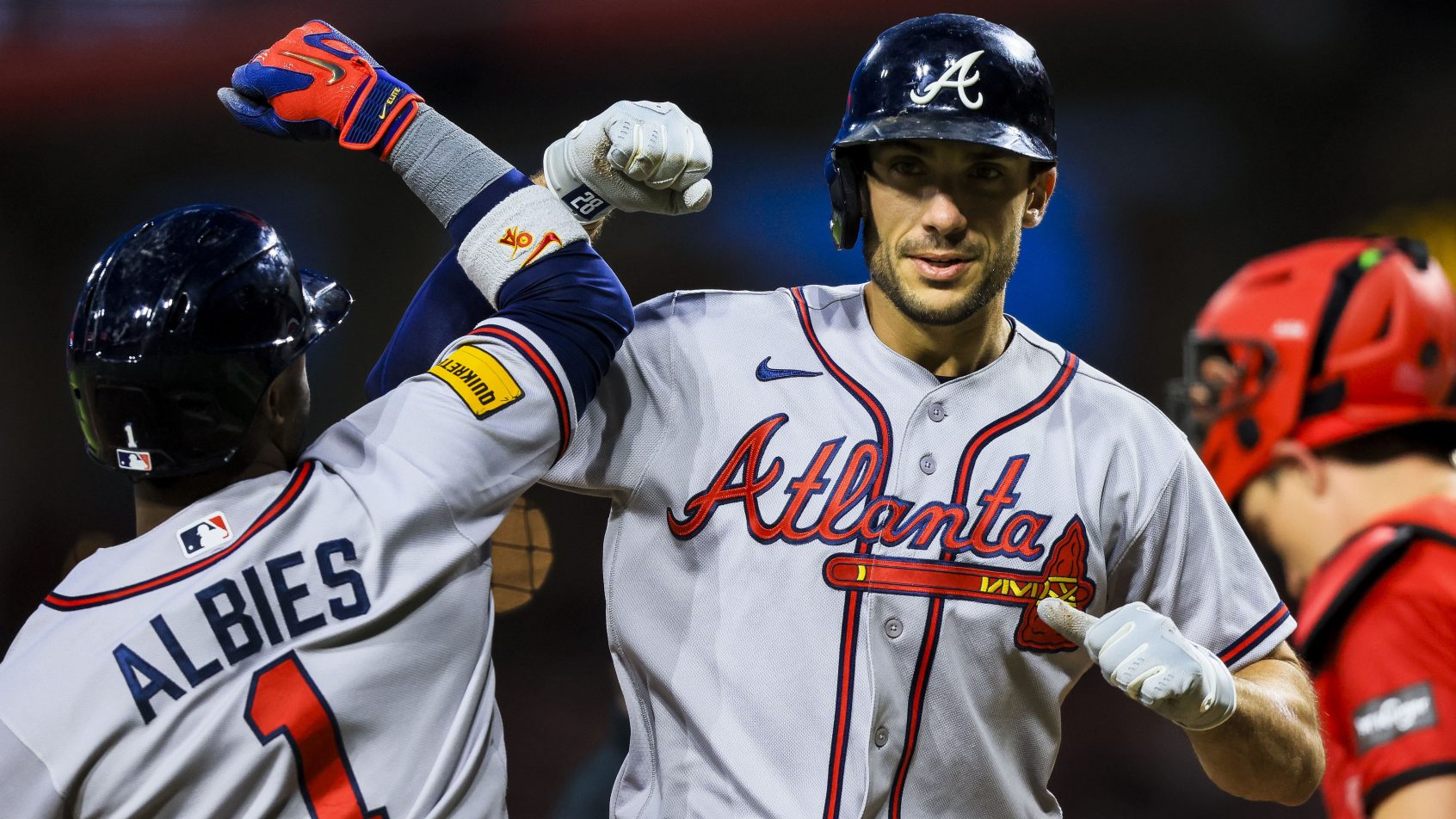 Matt Olson celebrates a solo home run versus the Reds.