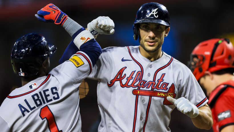 Matt Olson celebrates a solo home run versus the Reds.