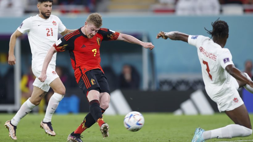 Kevin De Bruyne shooting the ball for Belgium.
