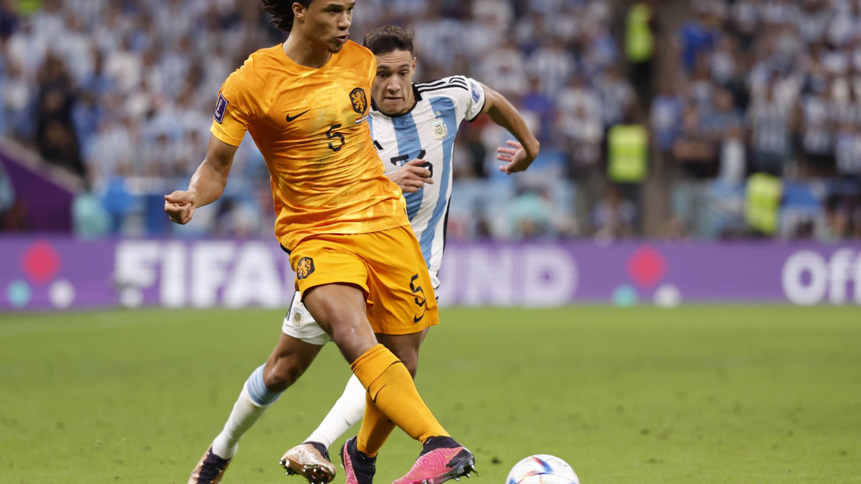 Netherlands defender Nathan Ake passing the ball