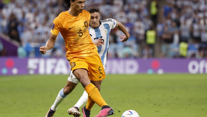 Netherlands defender Nathan Ake passing the ball