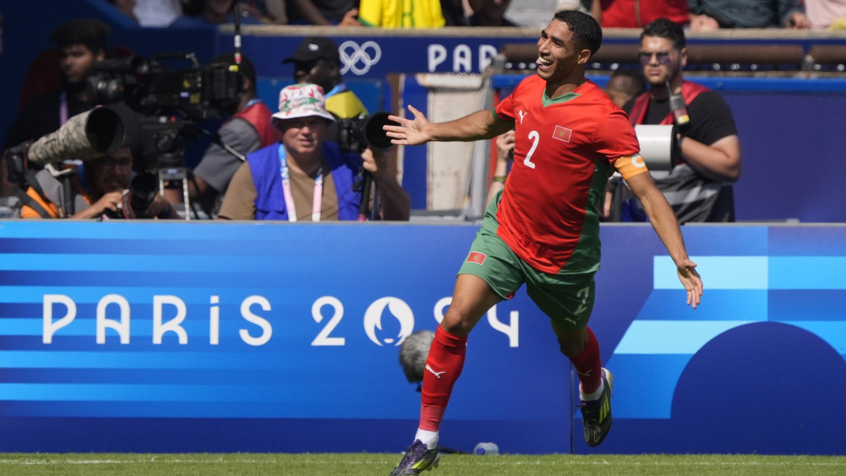 Achraf Hakimi celebrates a goal with the Morocco national team