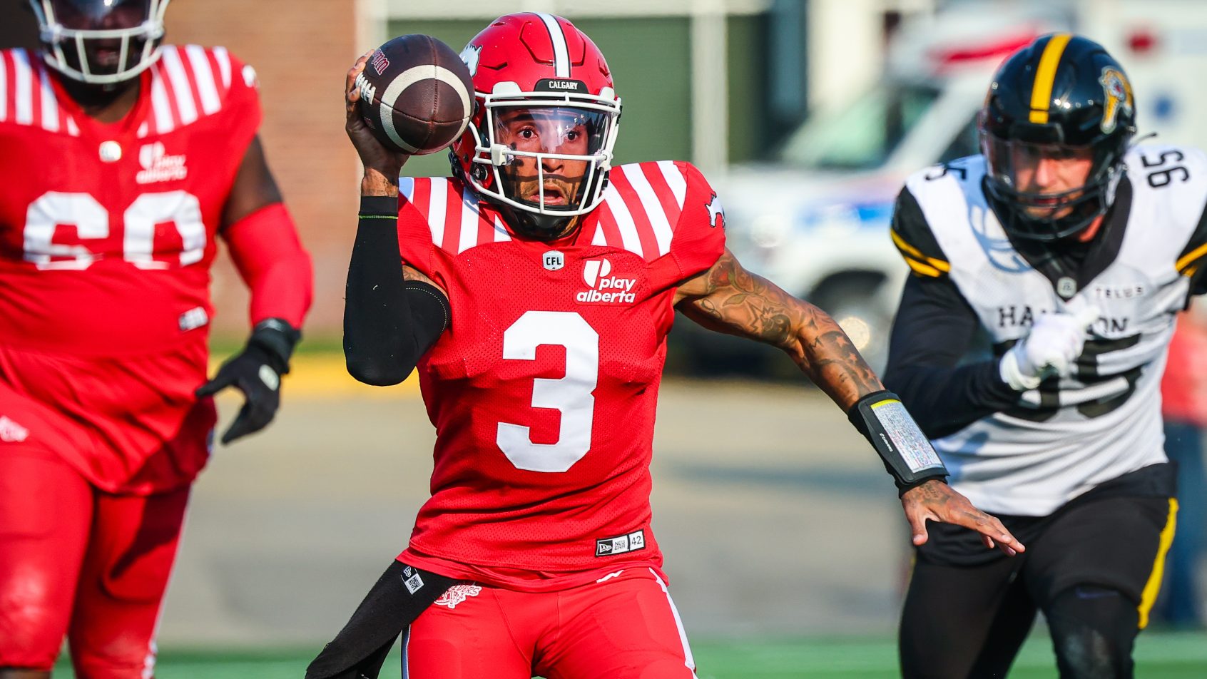 Vernon Adams scrambles versus the Tiger-Cats.