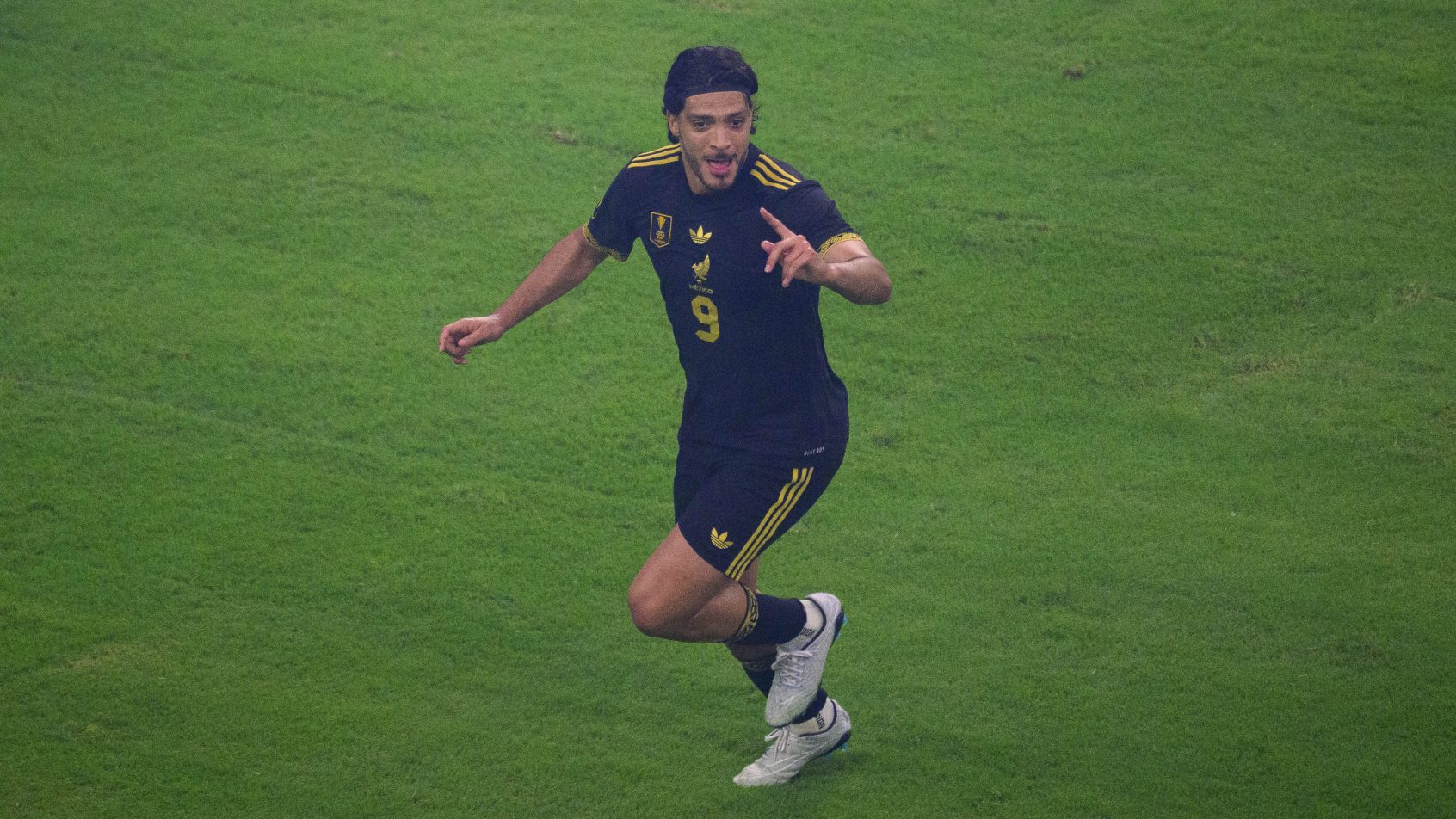 Raul Jimenez celebrating a goal with Mexico