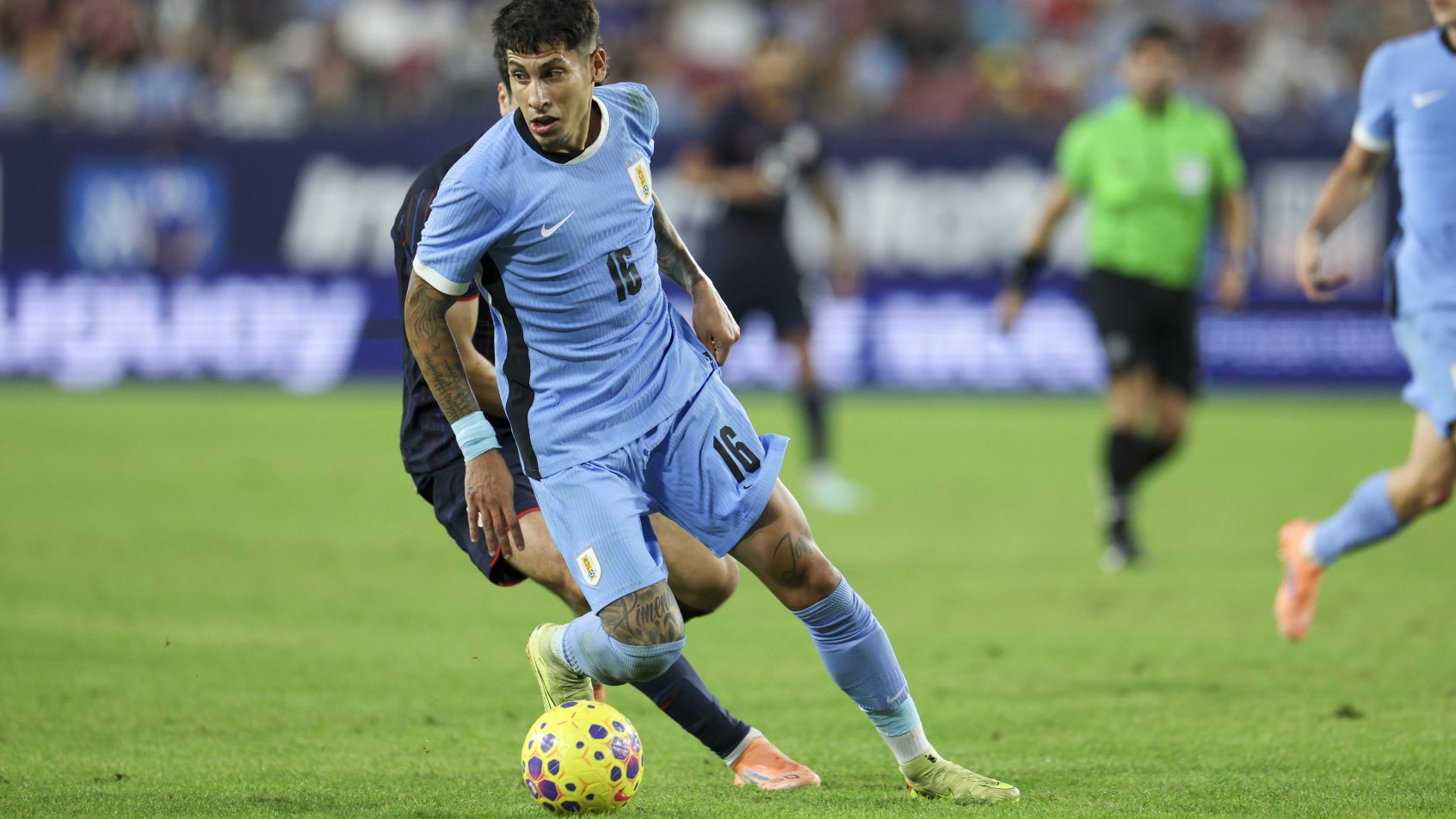 Mathias Olivera controls the ball for Uruguay in a match vs USA.
