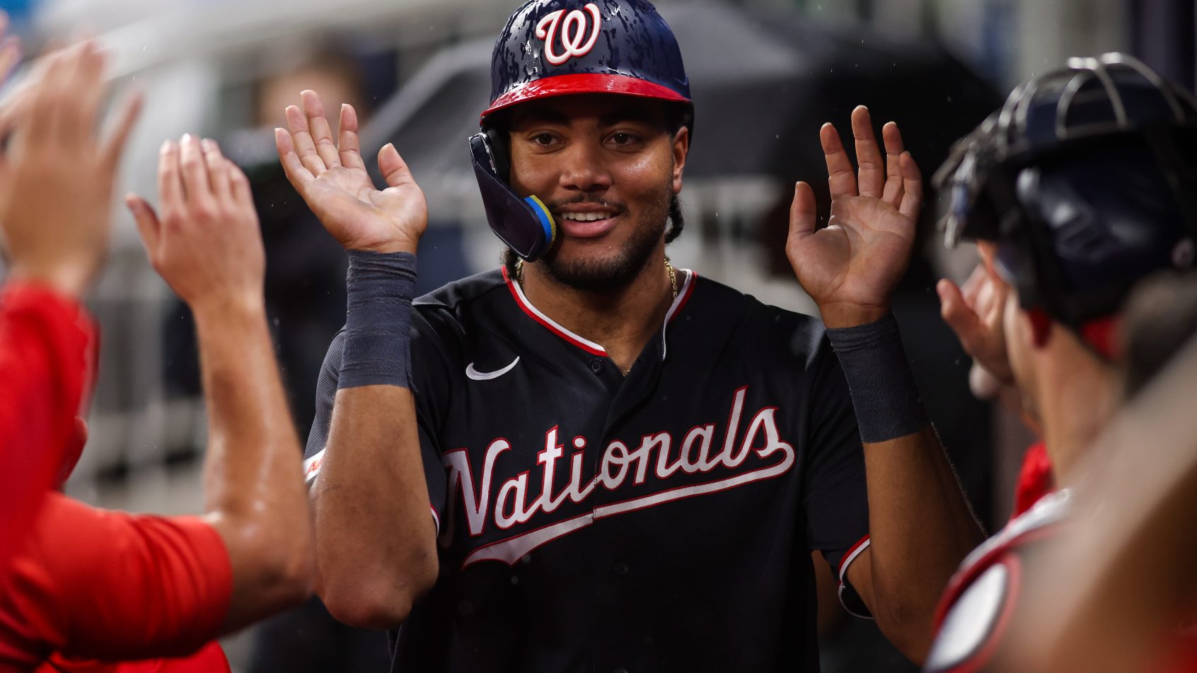 James Wood hi-fives in dugout