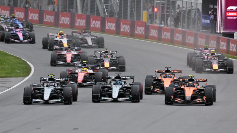 Kimi Antonelli and Lando Norris race into turn one at Montreal (2026).